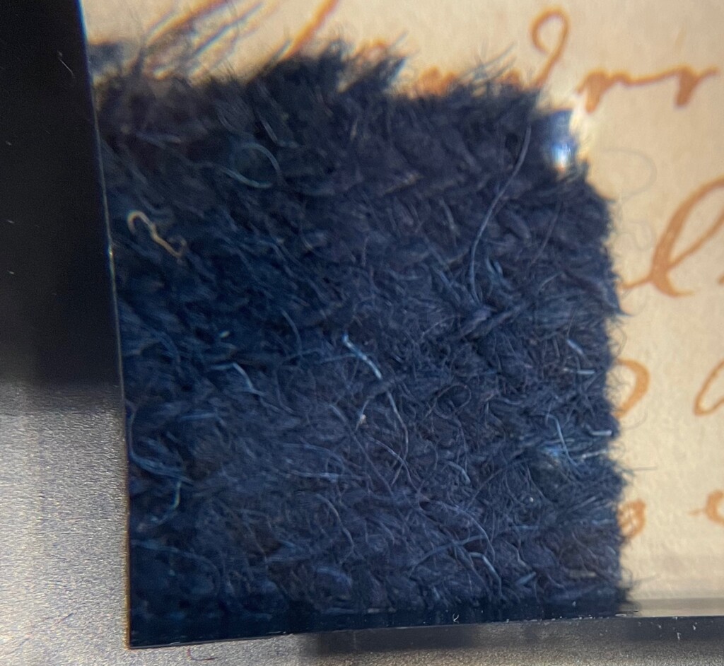 Magnified sample of an English Perpetuaan in a Danish Swatch Book from 1727